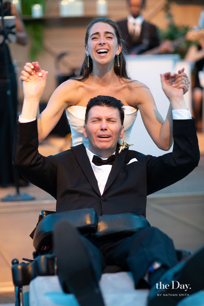 Jenna (Byron) Amster on her wedding day with her dad who has multiple system atrophy